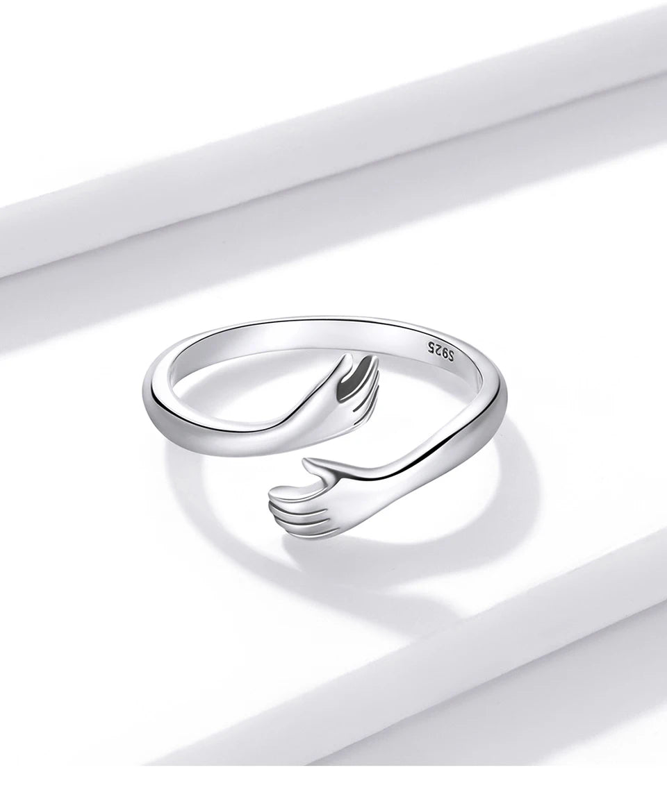 Suzi Ring: A Symbol of Love, 3 Colors from Luxe Jewelry is designed to evoke feelings of tenderness and connection